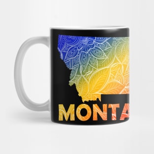 Colorful mandala art map of Montana with text in blue, yellow, and red Mug